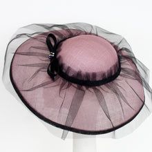 Pale Pink Sinamay Hat with Black Tulle Overlay.