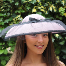 Pale Pink Sinamay Hat with Black Tulle Overlay.